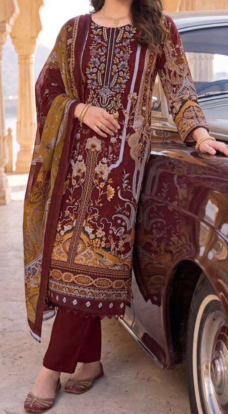 Maroon printed shalwar kameez with floral and geometric motifs